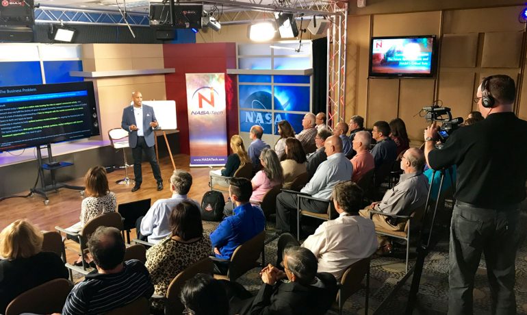 Livestream of NASA iTech with male presenter
