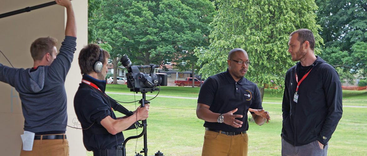 NIA digital media team video recording man talking about NASA 360 program